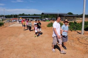 Members walking into the farm cautiously.